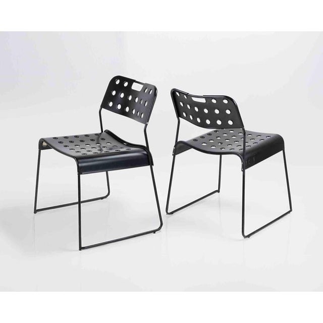 Six stackable Omstak chairs for Bieffeplast, realized in Italy in 1970. Production label. Perforated and bent steel sheet...