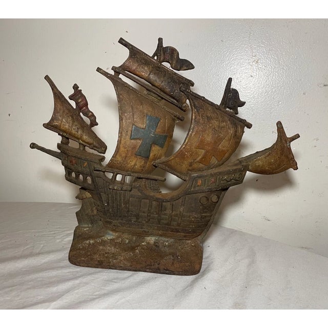 Add a touch of maritime charm to your home with this antique cold-painted cast iron nautical table/boudoir lamp. The lamp...