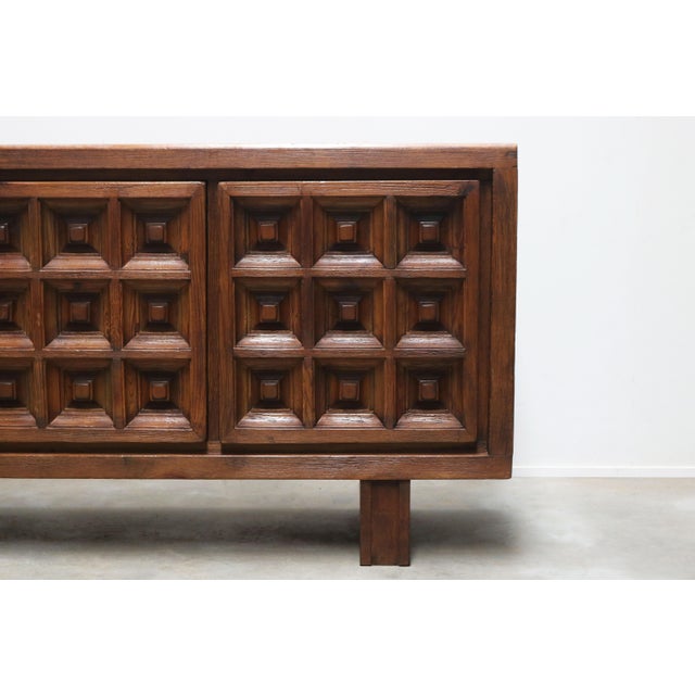 Exceptional spanish mid-century design sideboard by biosca 1960, beautifully crafted in solid stained pine. The three-door...