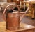 Originating from Normandy, France, this 19th-century watering can is a fine example of provincial craftsmanship. The...