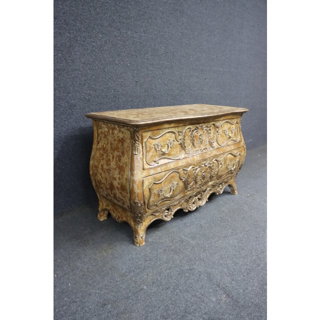 Louis XVI–style bombe chest by Century Furniture. Two full-size drawers with a serpentine front and carved ornamental...