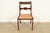 A gorgeous Regency style side chair or dining chair In the manner of Kindel Furniture USA, Circa 1940s Carved mahogany...