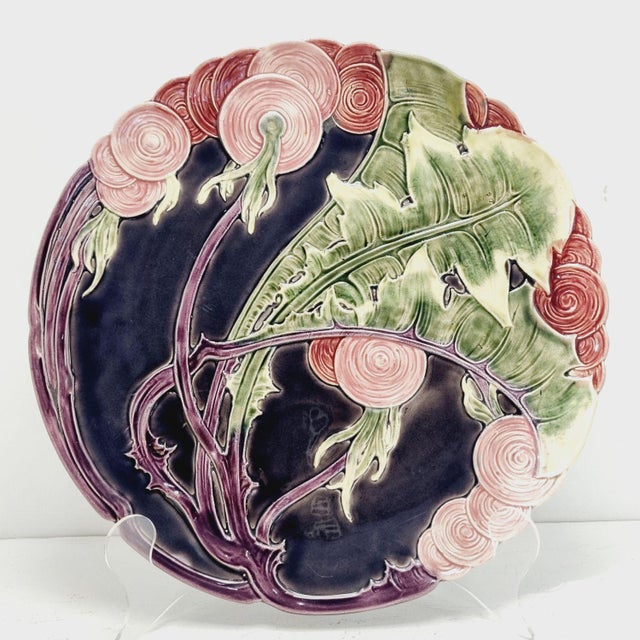 Art Nouveau majolica wall plate from the early 20th century, featuring a raised radish motif. Marked Schütz Blansko. In...