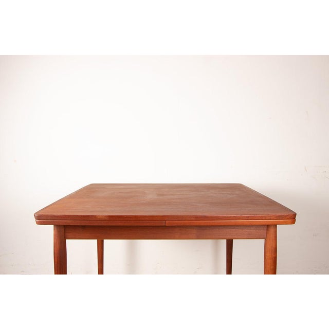 Danish Teak Model 592 Square Extendable Dining Table by Arne Vodder for Sibast, 1960, in Flawless conditions. Designed...
