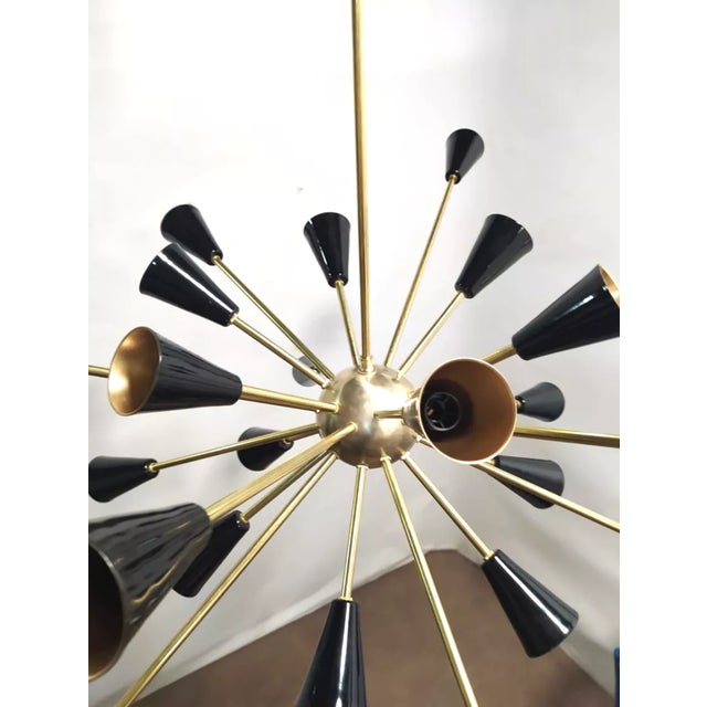 Large 24-light sputnik chandelier in brass and bronze - attributed to stilnovo description: magnificent 24-light sputnik...