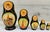 Celebrate the charm of traditional Russian folk art with this vintage five-piece hand-painted matryoshka nesting-doll set....