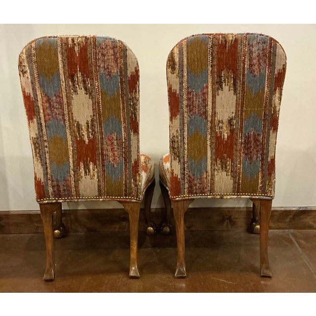 Chairs are absolutely beautiful. The knees are classic Chippendale with ball and claw feet and gold encrusted kneew. The...
