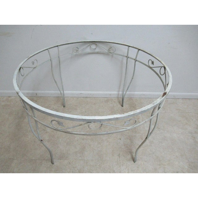 Vintage round outdoor patio porch ivy iron dinette dining table. Nice shape. Shows some wear. Please see photos as they...