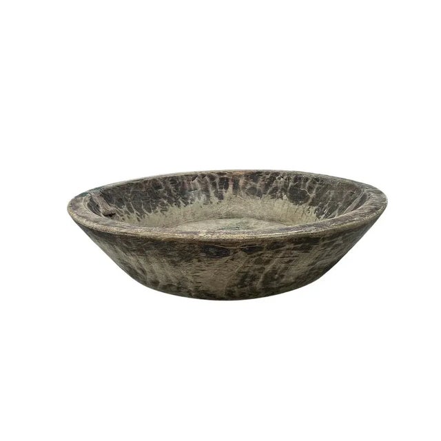 This vintage natural wood Parat bowl from India was once used to knead bread dough. It is a beautiful rustic piece and can...