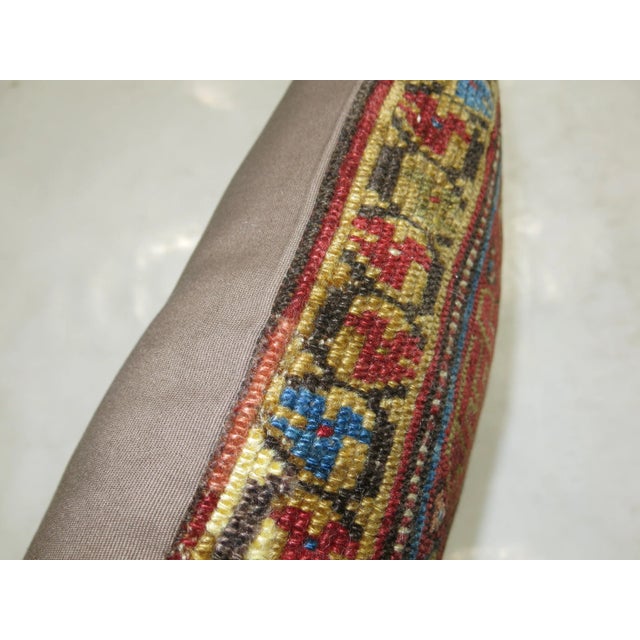 Pillow made from a vintage traditional Persian rug with cotton back. Zipper closure and foam insert provided. 20'' x 20''