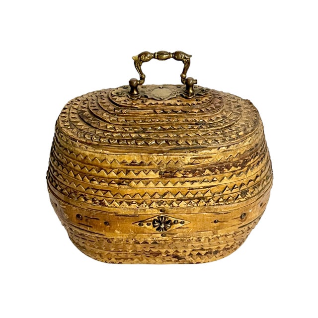 A charming antique French provincial tramp art box dating to the early 20th century, featuring intricate geometric chip-...
