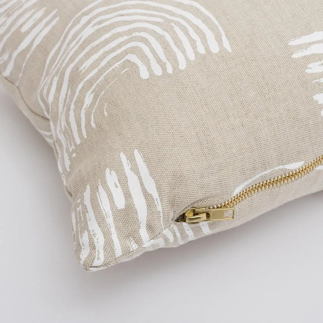 This pillow features Squiggles by Caroline Z Hurley with a knife edge finish. The repeated rainbow-shaped curves of this...