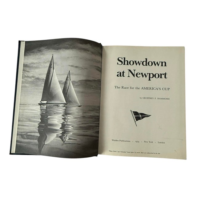 This collectible book titled "Showdown At Newport The Race for the America's Cup" by Geoffrey F. Hammond is a must-have...