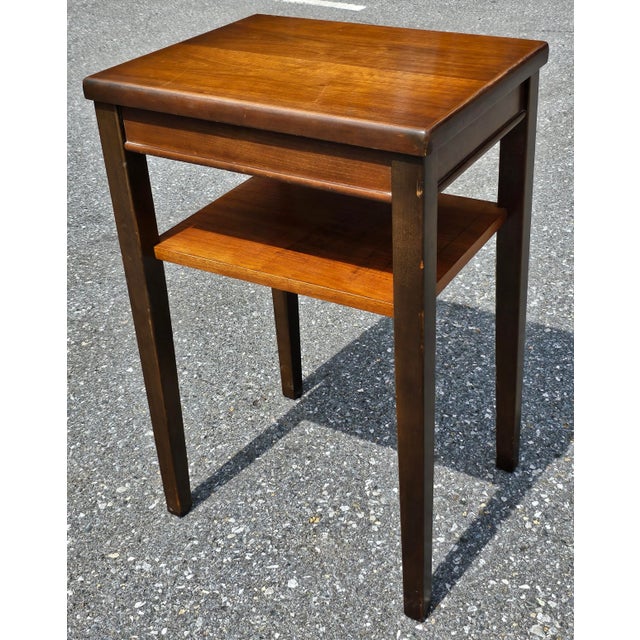 A late 20th Century Walnut Two-Tier Side Table or Stand in very good vintage condition. Measures 20" w x 16" deep and...