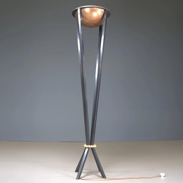 This floor lamp by Paul Belvoir, crafted in 2017, features a sleek and modern design with metal construction. Perfect for...