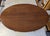 A beautifully executed Arts & Crafts / Mission-style oval library table by Stickley, bearing both the branded mark and...