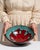 This 1970s serving bowl from Italy is finished in teal, worked in ceramic. Its form follows honest, well-proportioned...