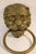 This lion head shaped door knocker is an impressive piece of solid brass dating from the mid 20th century. The door...