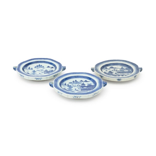 Set of Three Chinese Export Blue and White Porcelain Warming Plates, each hand-painted with willow trees and pagoda...