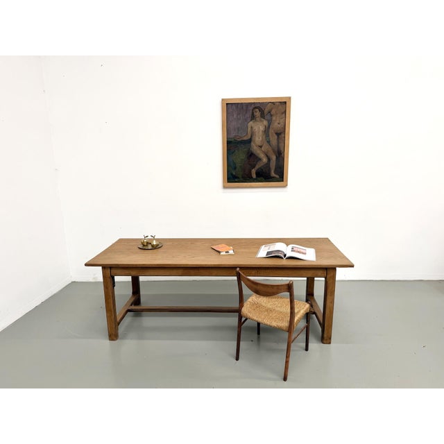 Maison Lecan presents this 1970s farmhouse table in solid oak. A traditionally crafted table, designed in the style of...
