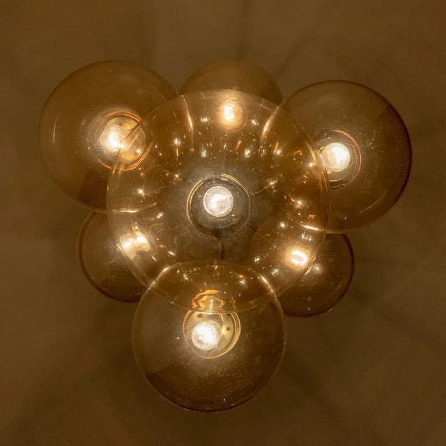 Absolutely amazing huge ceiling mount pendant light fixture with seven different sizes of globes or spheres by limburg...