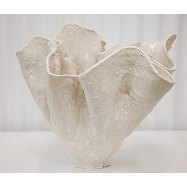 Experience the exquisite artistry of the Flourish Series ofVases at The Shine Studios, where each piece will be Varying...