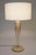 A minimal and futuristic atomic Modern tripod Brass & cerused Ash wood table lamp possibly designed by Gerald Thurston for...