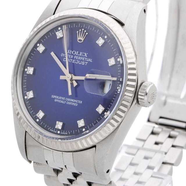 Rolex Oyster Perpetual Datejust reference 16014 in stainless steel with a fixed 18k white gold fluted bezel, the...