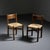 Pair of Méribel chairs designed by Charlotte Perriand in the 1940s for the Méribel ski resort in the French Alps. The ash...
