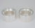 A modernist silver plate and crystal caviar serving bowl duo—also suitable as chiller dishes—designed by renowned...