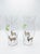 Add a touch of exotic elegance to your home decor with this striking pair of hand-painted hurricane glass vases. Crafted...