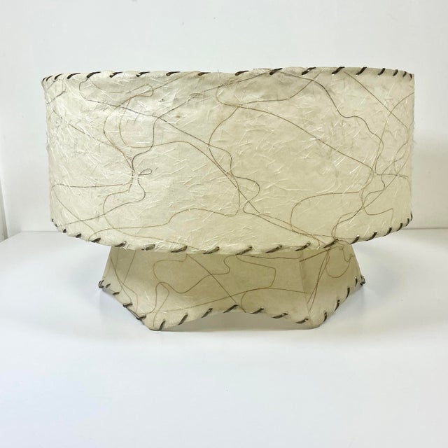This is a gorgeous vintage Fiberglass Lamp Shade. It features two Tiers with a random spaghetti design in chestnut and...