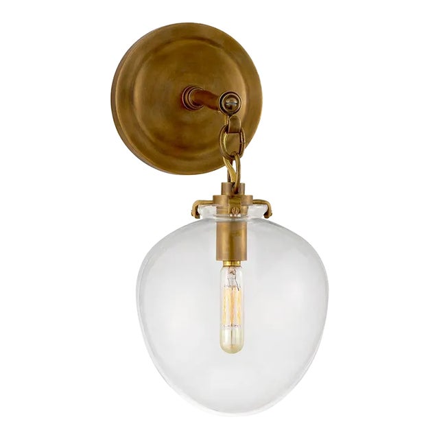 Thomas O'Brien for Visual Comfort Signature Katie Small Acorn Sconce in Hand-Rubbed Antique Brass with Clear Glass For Sale