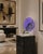 Striking 1994 postmodern abstract table sculpture featuring a bold geometric composition of clear and purple Lucite...