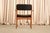 These are the chairs Erik Buch is best known for, the ones where the seat and backrest appear to float free of the frame,...