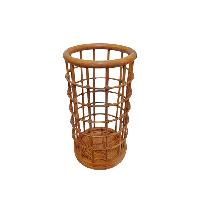 Such a chic piece! Perfect way to add some texture to your space. Woven bamboo and rattan umbrella stand. This piece has a...