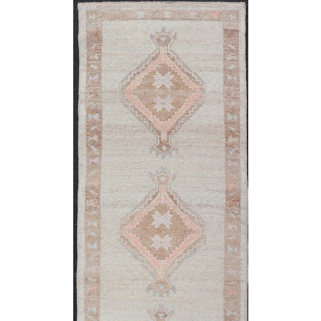 Textile Turkish Oushak Runner With Soft Ivory Field and Peach Geometric Medallions For Sale - Image 7 of 12