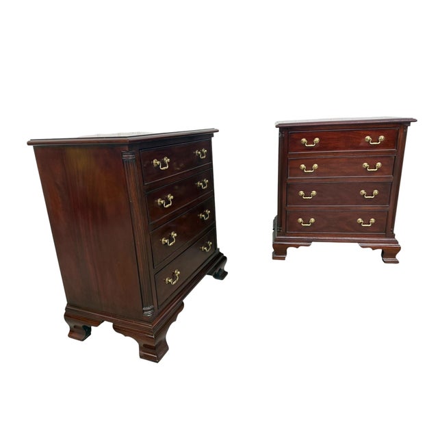 Crafted with the timeless quality Henkel Harris is known for, this exceptional pair of vintage mahogany bachelor chest...