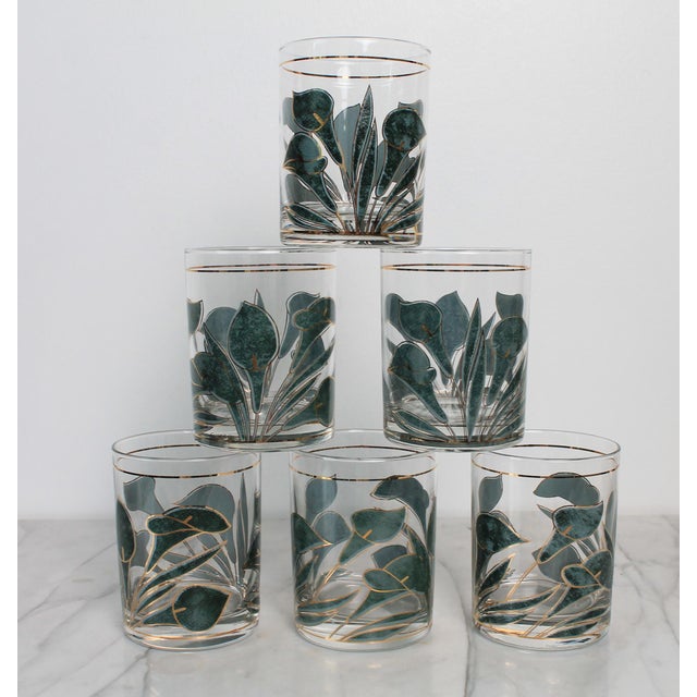 Set of six vintage Calla Lily low ball drinking glasses. Makers mark on each glass. No chips or cracks. Some light wear to...