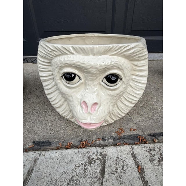 Up for sale is a stunning matched pair of vintage ceramic monkey head planters — a showstopping find for any collector of...