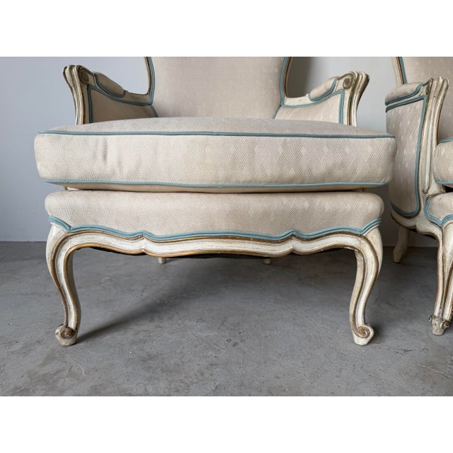 Cream Pair of Vintage Hollywood Regency French Louis XV-Style Painted & Gilt Bergère Lounge Armchairs For Sale - Image 8 of 12