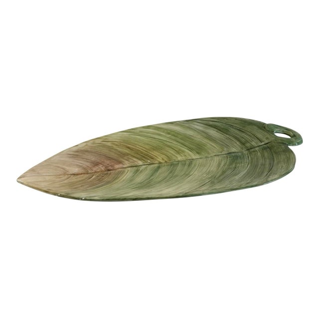Lovely vintage mid-20th century banana leaf–shaped platter featuring a beautifully glazed ceramic finish and naturalistic...