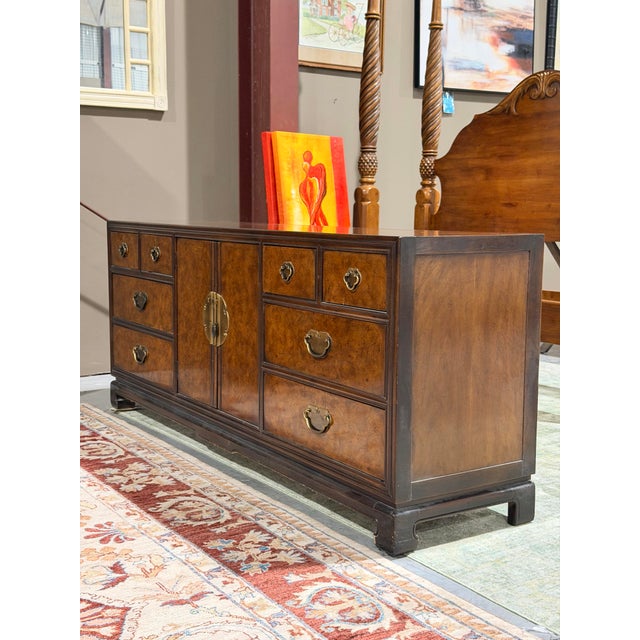 A remarkable Drexel Heritage Ta Ming dresser that blends Hollywood Regency glamour with timeless Chinoiserie styling....