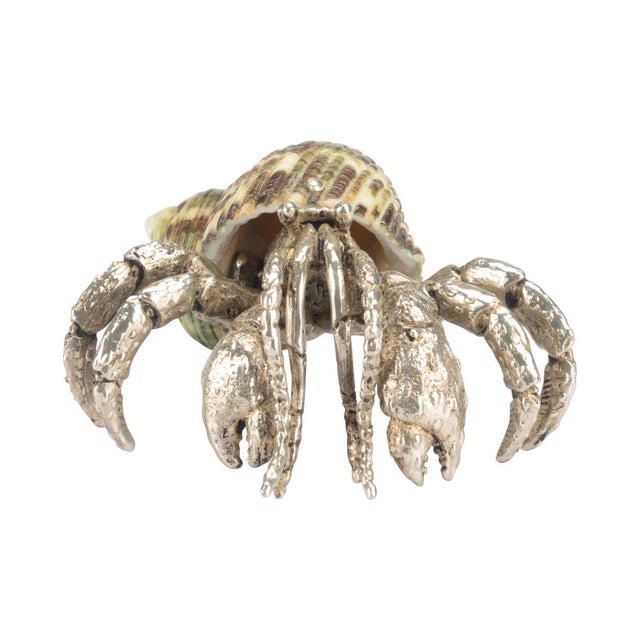 A small creature with unique detail the Hermit Crab Paperweight is made of a silver plated body and jade turbo shell. A...