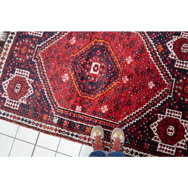 Antique Persian Shiraz Rug - Triple Hexagonal Medallion 4.4' x 6.6', 1920s This striking antique Persian Shiraz rug,...