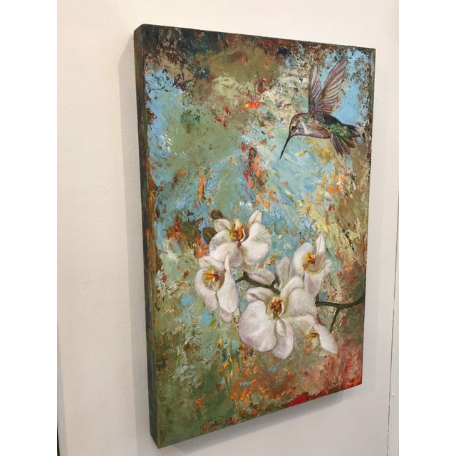 Romantical by Carrie Goller | Oil on Wood Panel Hummingbird above white orchids For Sale