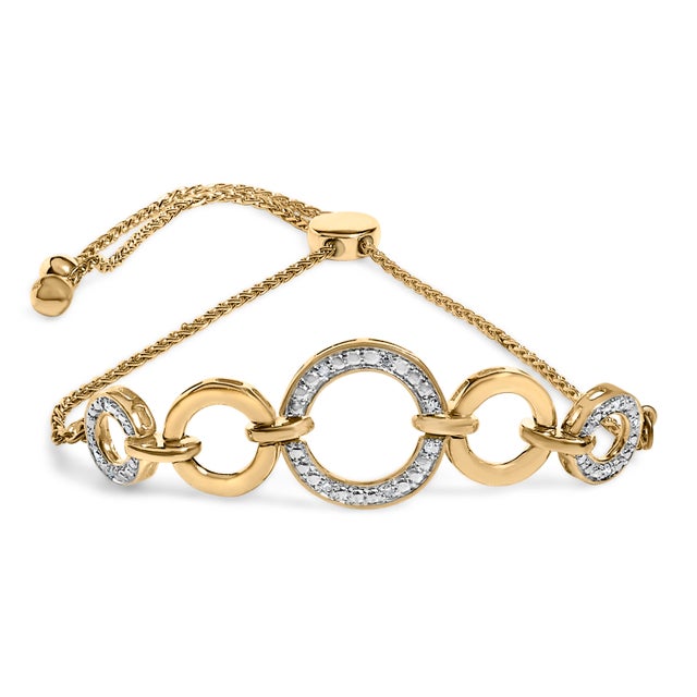 A whisper of forever for your wrist, this luminous bracelet marries meaning with modern ease. Interlocking open circles...