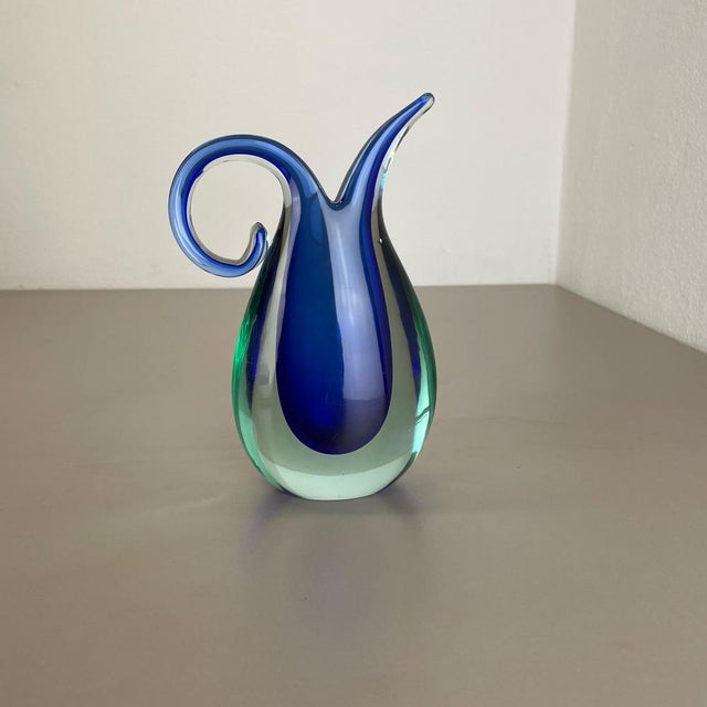 Article: Murano glass vase. Origin: Murano, Italy. Decade: 1970s. This original vintage glass vases was designed by Flavio...