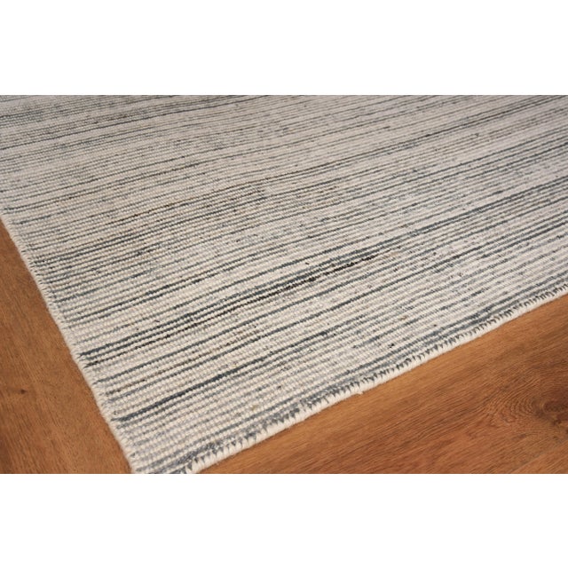 By using contrasting multi-color in this subtle striped pattern, the subdued pops of the accent colors give a nice twist...