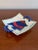 Beautiful ceramic serving plater. Red white and blue color profile with an expertly designed fish. Two handles and the...